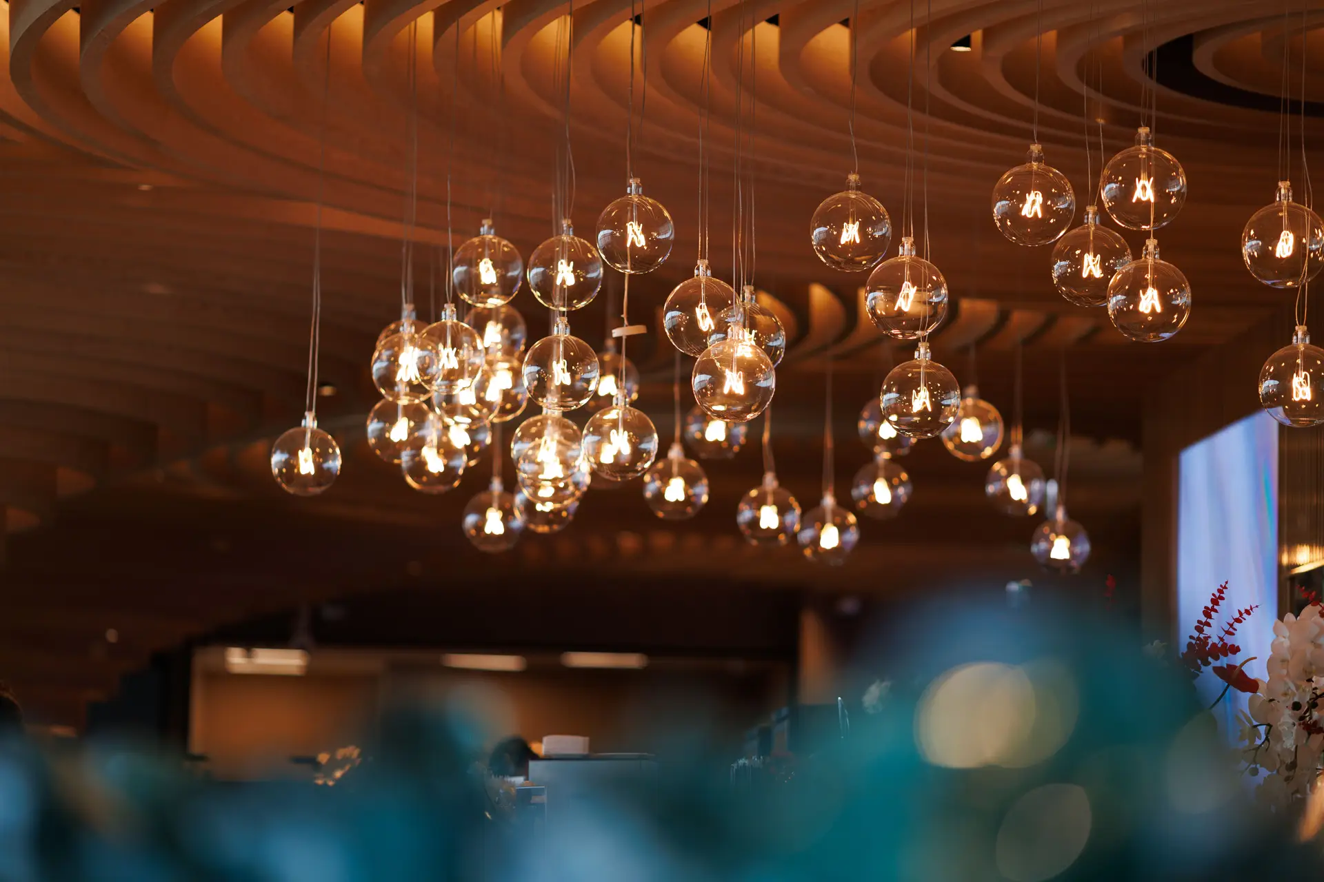 Artistic sculptural chandelier forming an organic silhouette