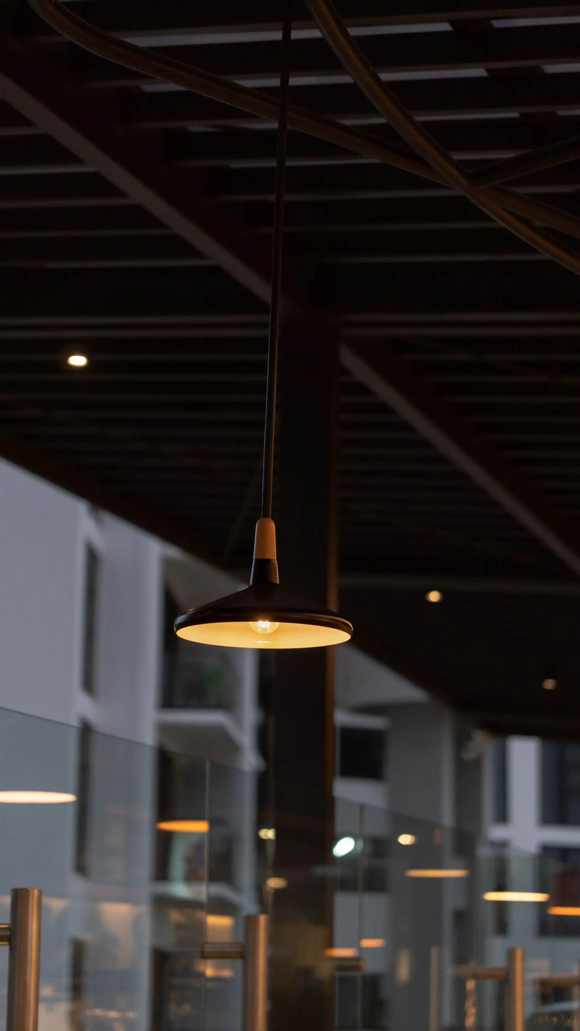 Contemporary exterior architectural light fixture braving nocturnal outdoor elements