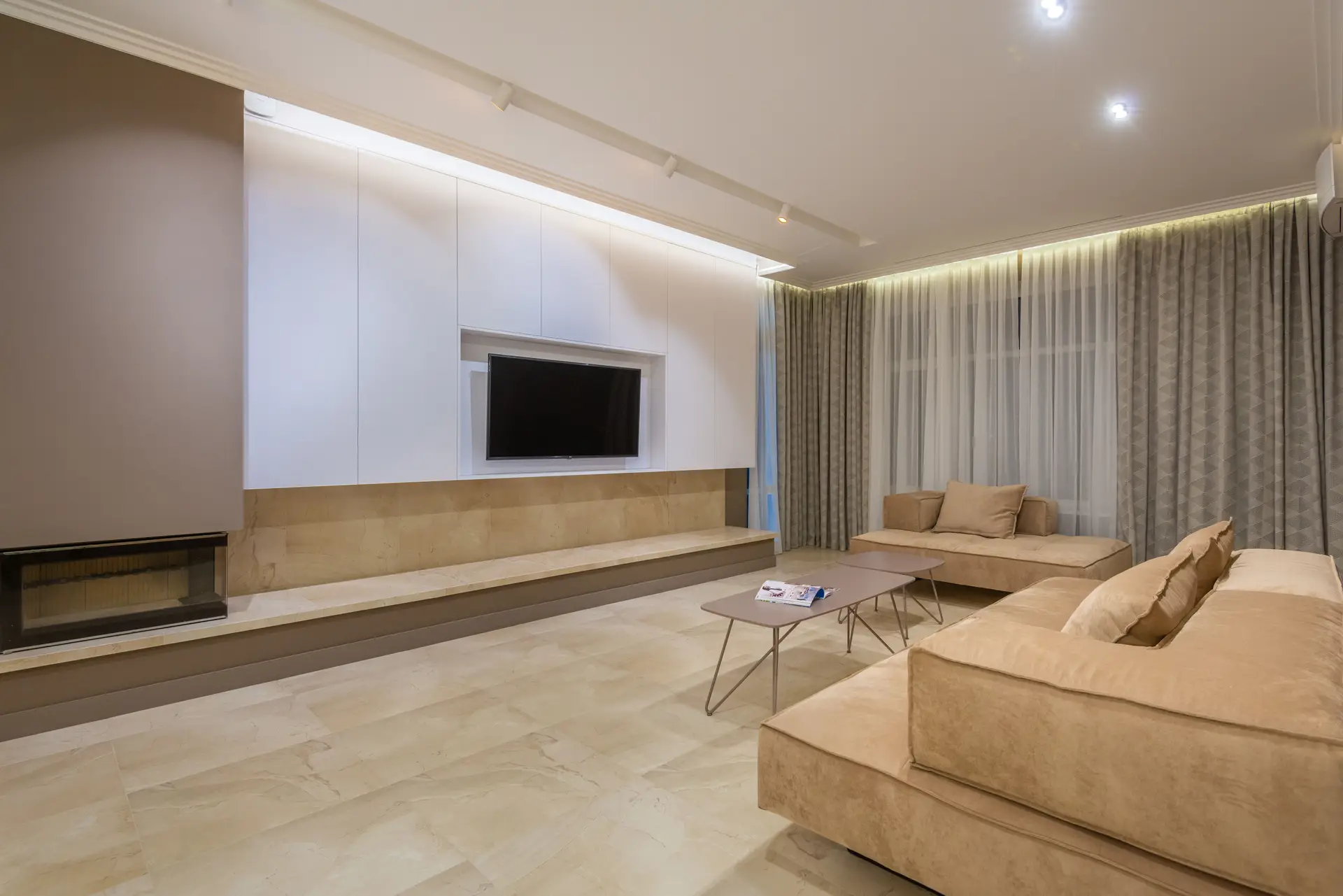 Tactile plaster wall texture illuminated by architectural grazing fixture