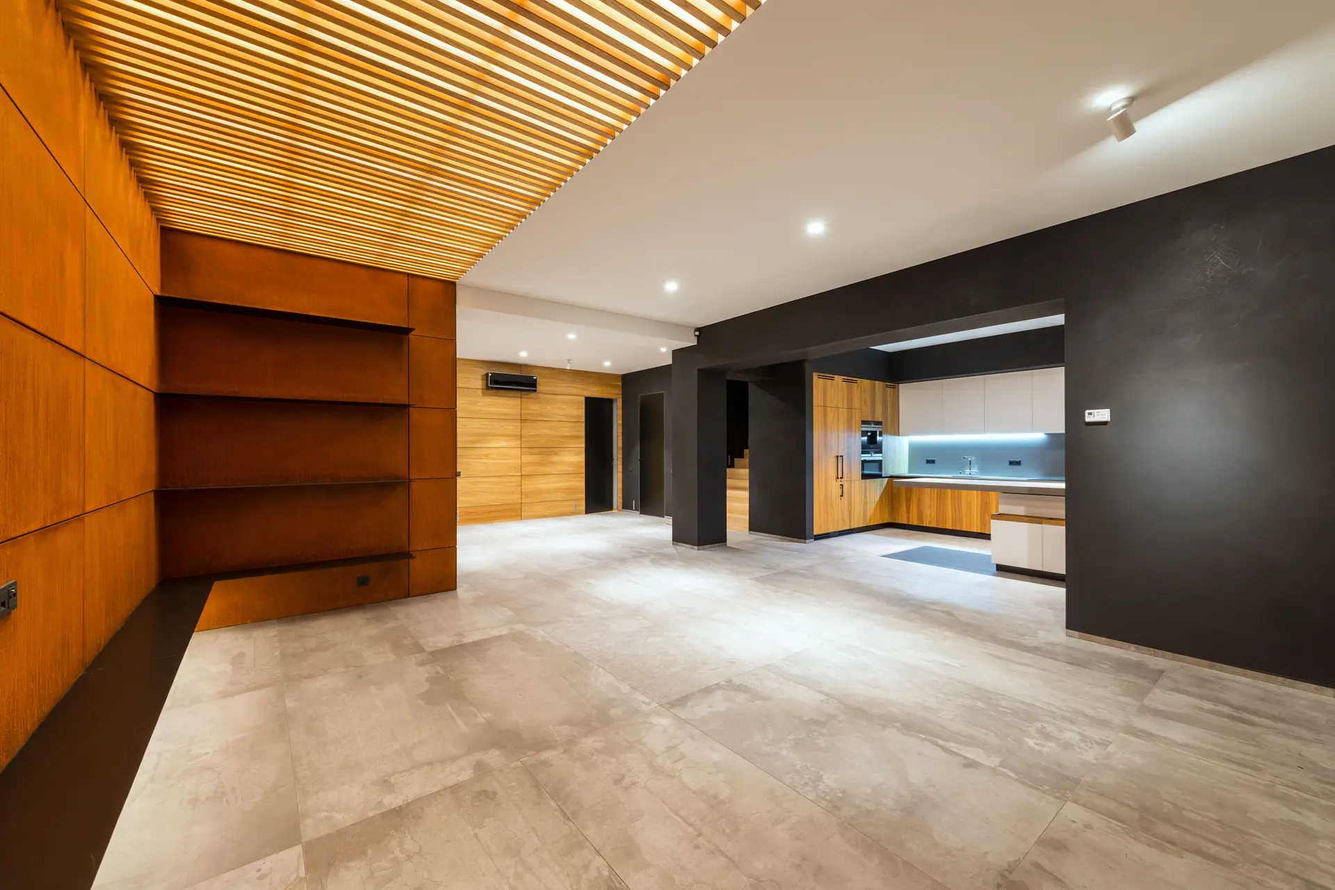 Architectural timber and diffuse warm light within a minimalist Canadian residence